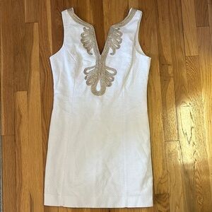 Elegant White Dress with Gold Accents